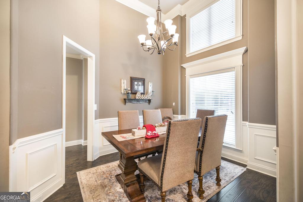 312 Bridgehampton Way Perry, GA 31069 - Photo 8 of 34 a view of a dining room with furniture window and wooden floor