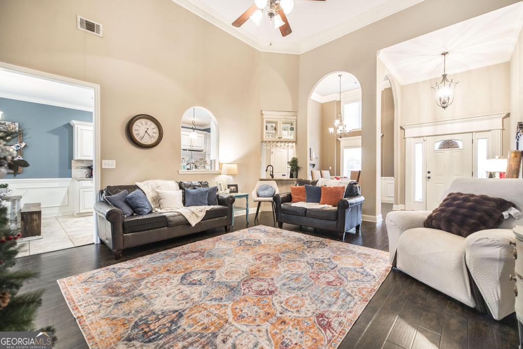 312 Bridgehampton Way Perry, GA 31069 - Photo 10 of 34 a living room with furniture and a large window