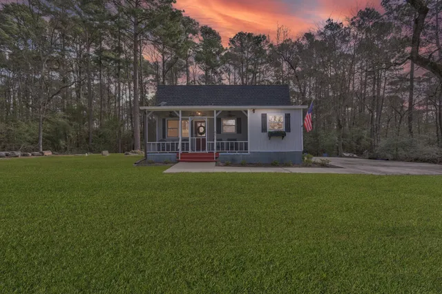 a house view with a garden space