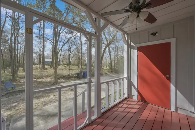 a view of porch with wooden floor