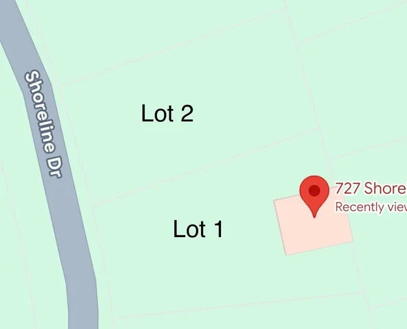 a view of a house with garden and trees