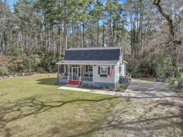 a backyard of a house with lots of green space