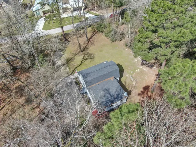 a aerial view of a yard with swimming pool