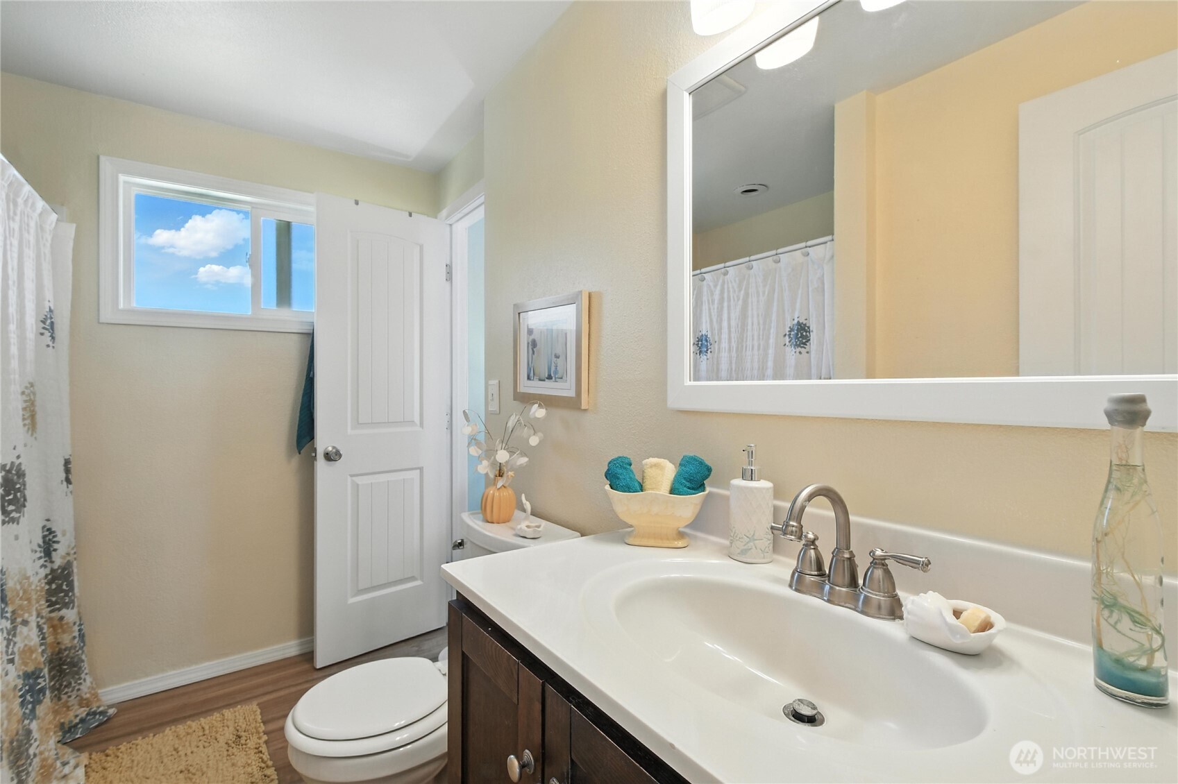 2102 35th Avenue Longview, WA 98632 - Photo 19 of 31 a bathroom with a sink toilet and shower