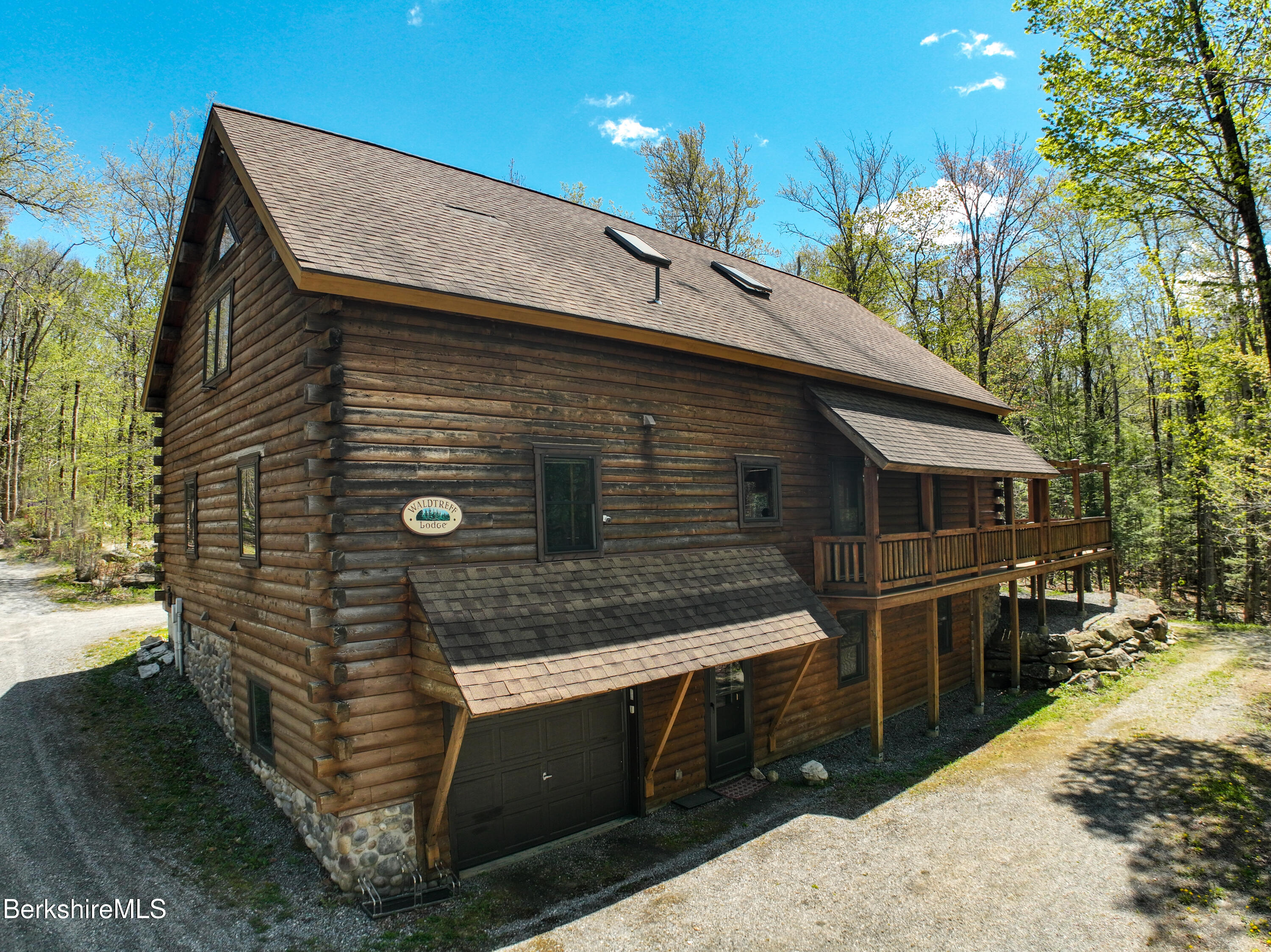 a front view of a house with yard