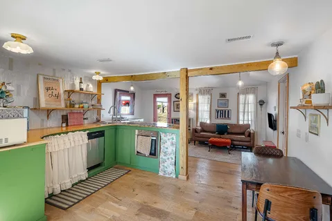 a kitchen with stainless steel appliances lots of counter top space