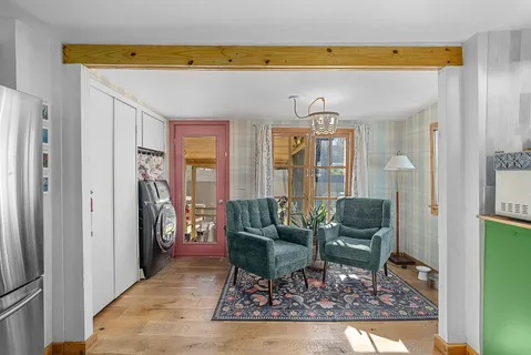 a living room with furniture and a table