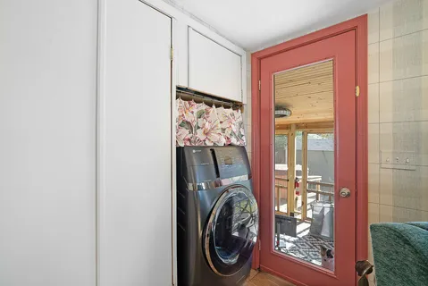 a view of a storage & utility room with a sink