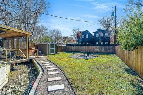 a view of swimming pool with a patio