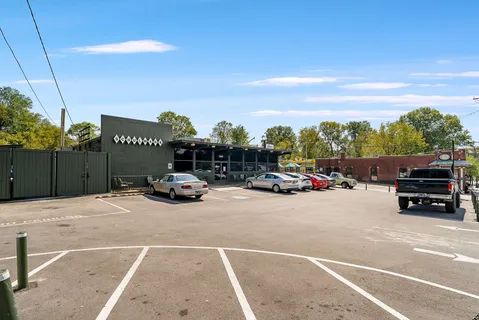 a view of a car parked in front of house