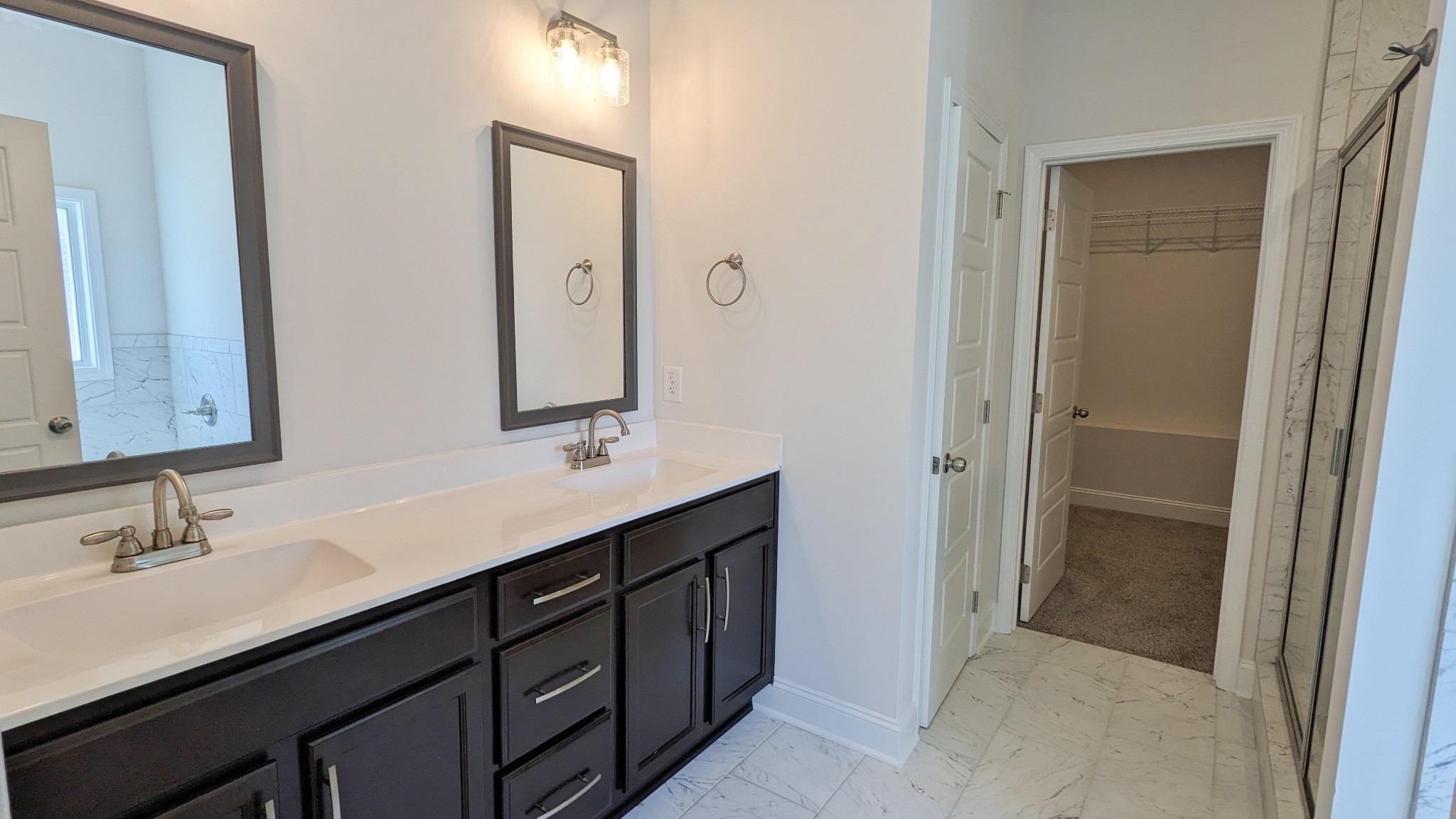 602 Alvin Road Clarksville, TN 37042 - Photo 22 of 39 a bathroom with a sink double vanity and a mirror