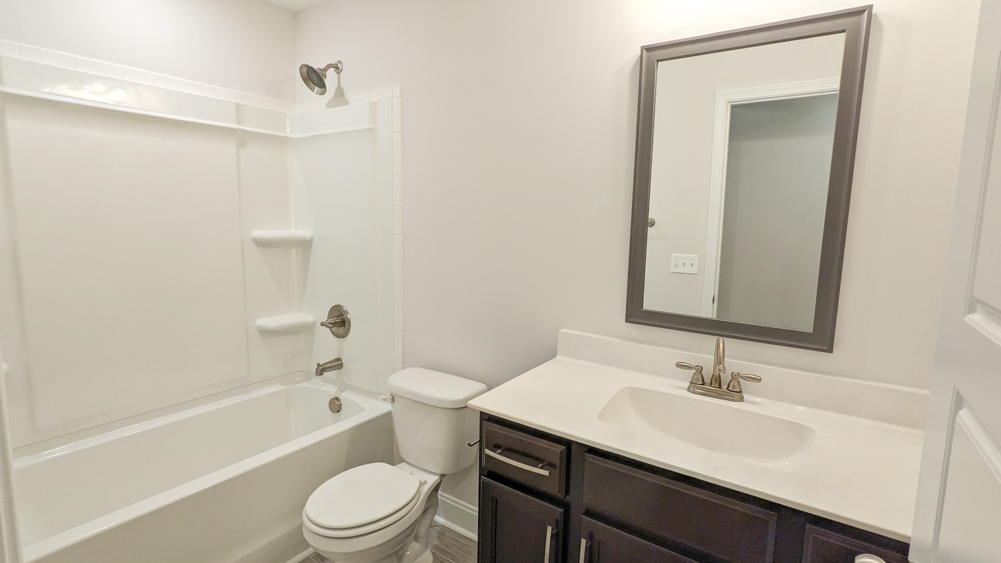 602 Alvin Road Clarksville, TN 37042 - Photo 36 of 39 a bathroom with a sink a toilet and shower