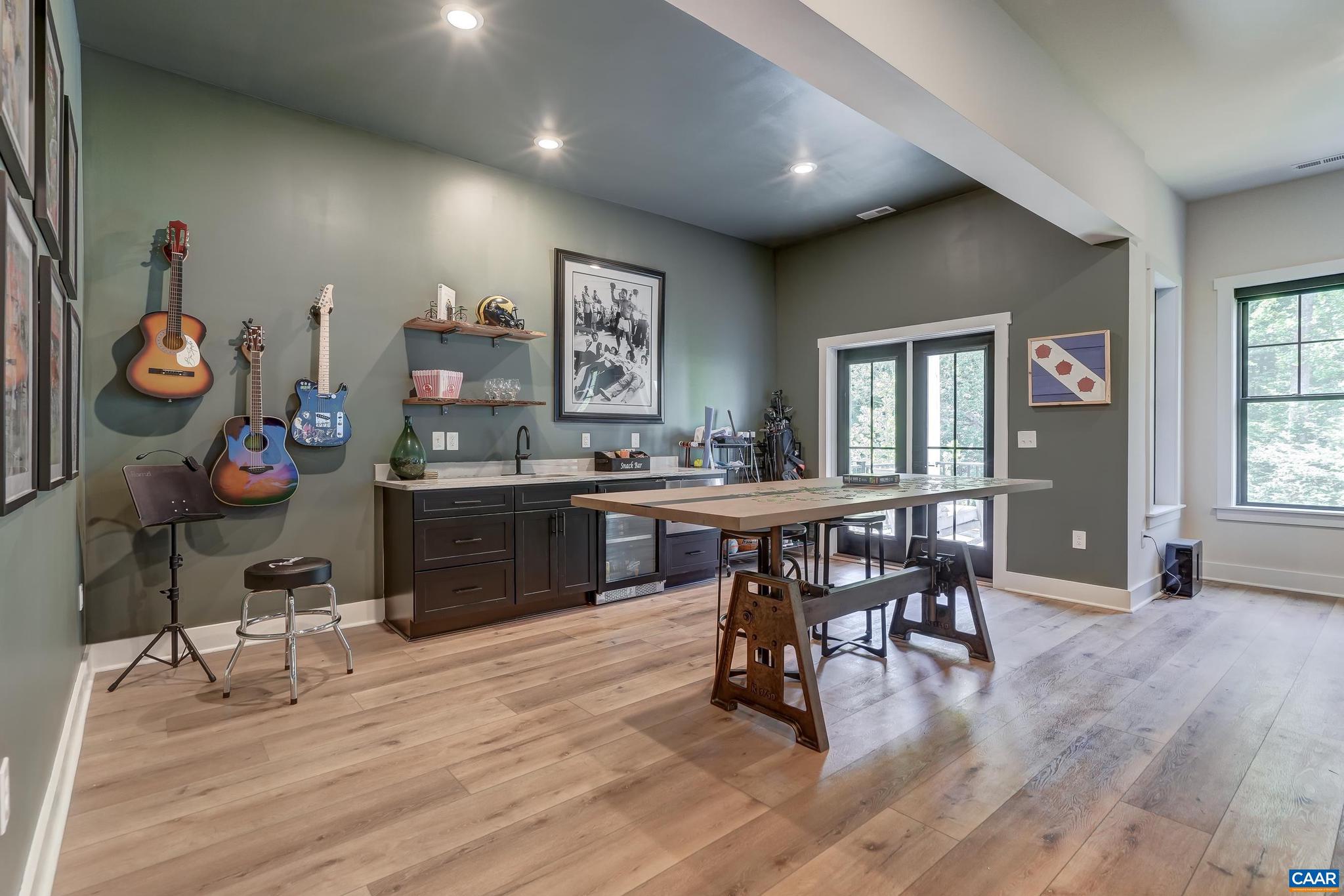 3327 Rowcross Street Crozet, VA 22932 - Photo 43 of 63 a view of a dining room with furniture and wooden floor