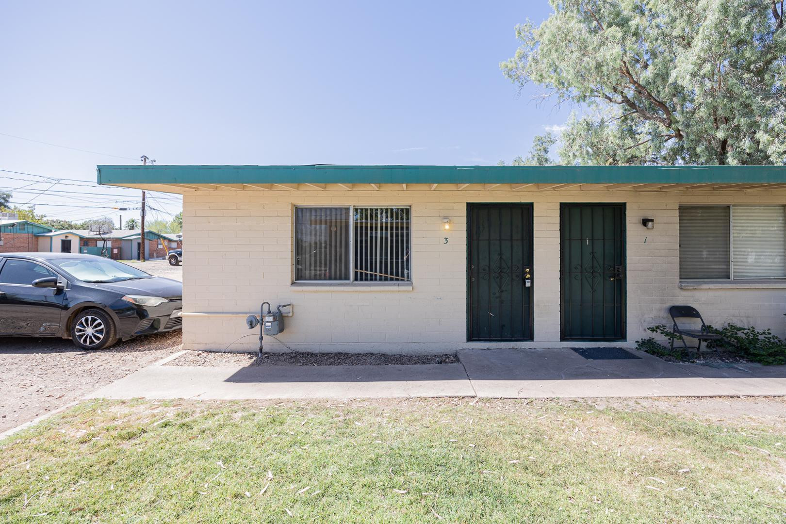 1017 South Mariana Street, Unit 3 Tempe, AZ 85281 - Photo 3 of 9 a view of a car in front of a house
