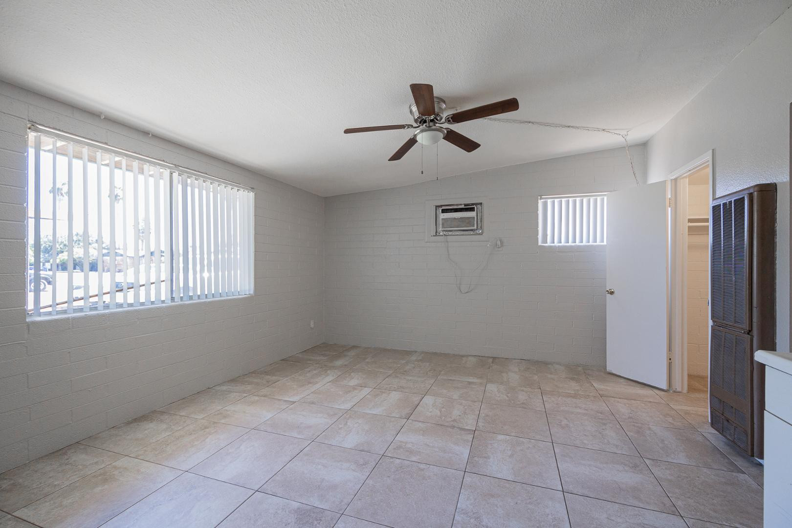 1017 South Mariana Street, Unit 3 Tempe, AZ 85281 - Photo 8 of 9 a view of an empty room with a window