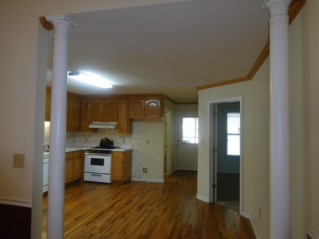 6905 Lower Thomaston Road Macon, GA 31220 - Photo 11 of 18 a view of a kitchen with a sink cabinets and a window