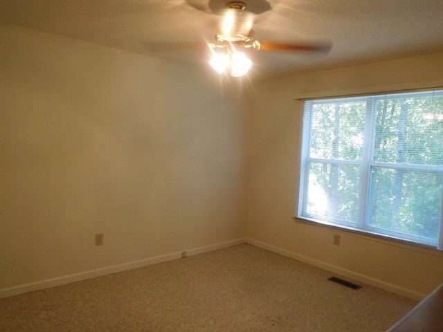 6905 Lower Thomaston Road Macon, GA 31220 - Photo 16 of 18 an empty room with a window