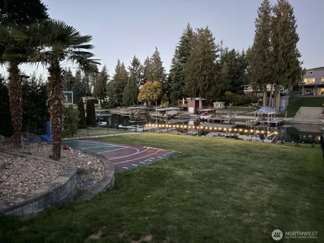 a view of a chairs and tables in the back