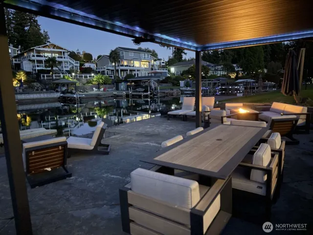 a swimming pool with trees in the background