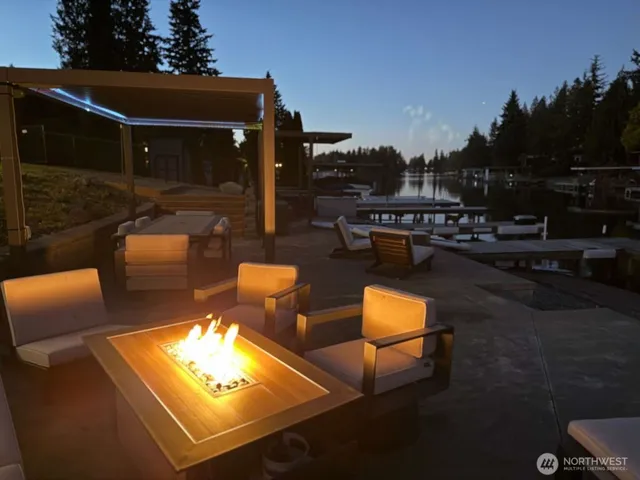 a view of a chairs and table in the patio