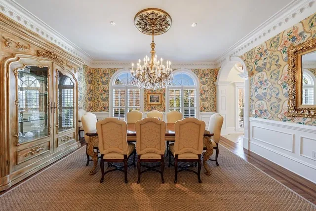 a kitchen with stainless steel appliances granite countertop a stove and cabinets