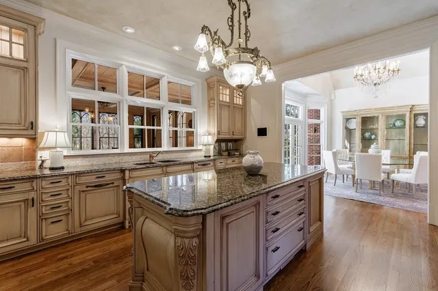 a bathroom with bathtub and window