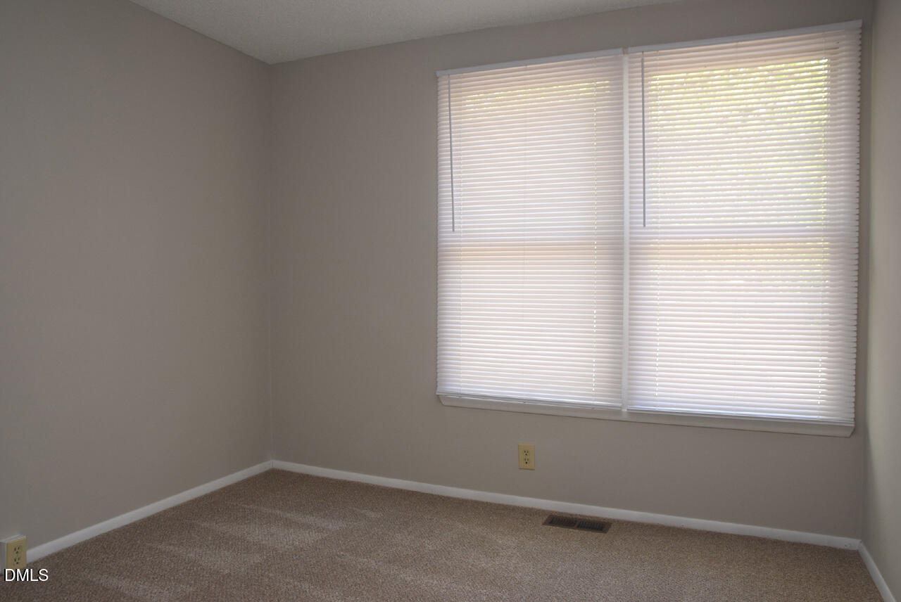 7712 Kingsberry Court Raleigh, NC 27615 - Photo 17 of 25 2nd Bedroom