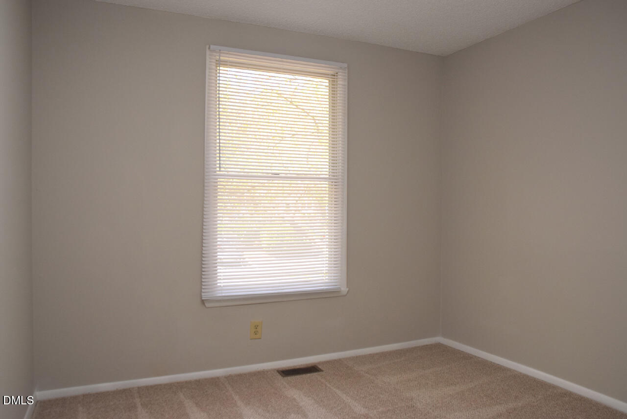 7712 Kingsberry Court Raleigh, NC 27615 - Photo 19 of 25 3rd Bedroom