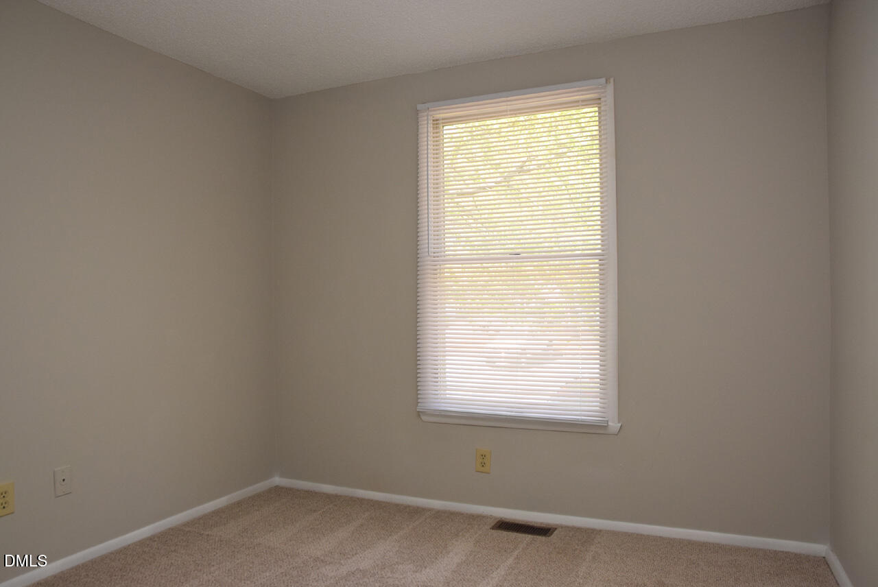 7712 Kingsberry Court Raleigh, NC 27615 - Photo 21 of 25 3rd Bedroom