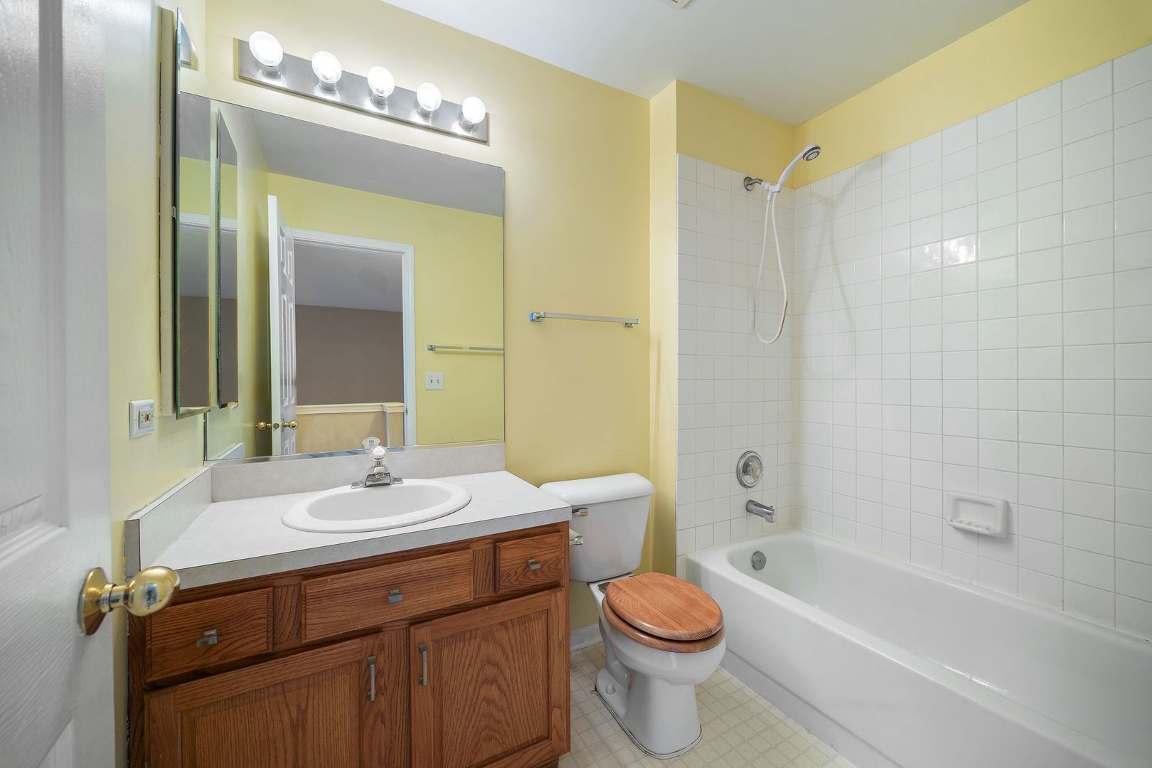 2067 Peach Tree Lane Algonquin, IL 60102 - Photo 16 of 18 a bathroom with a bathtub shower sink mirror and toilet