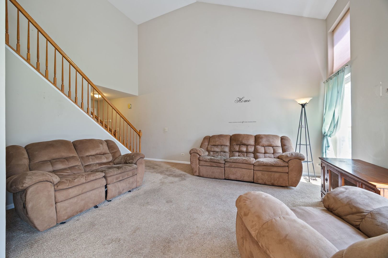 2067 Peach Tree Lane Algonquin, IL 60102 - Photo 6 of 18 a living room with furniture and stairs
