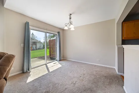 a view of an entryway with garden