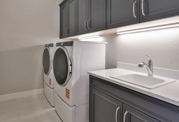 a view of a backyard with swimming pool