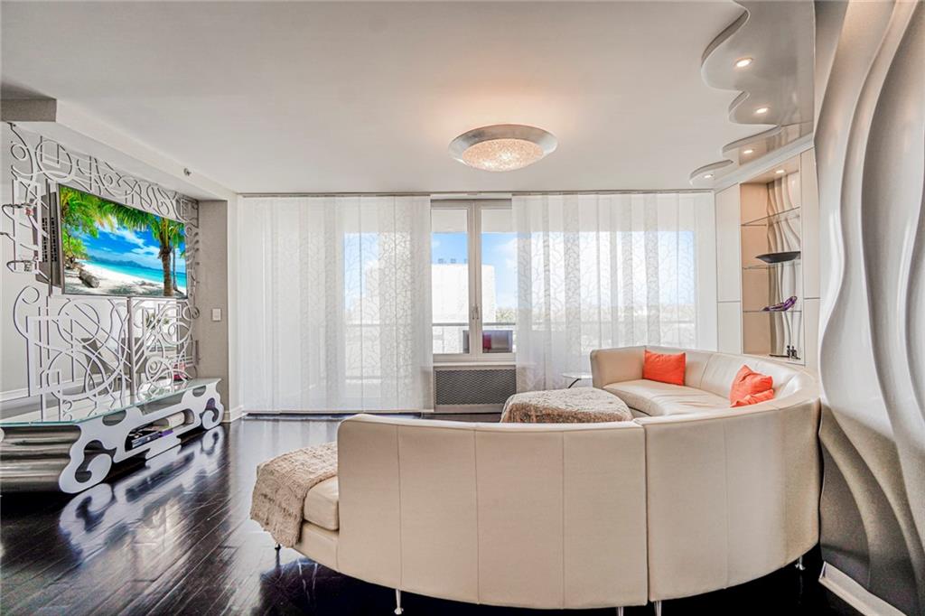 1702 Avenue Z, Unit 6B Brooklyn, NY 11235 - Photo 18 of 40 a living room with furniture and a flat screen tv