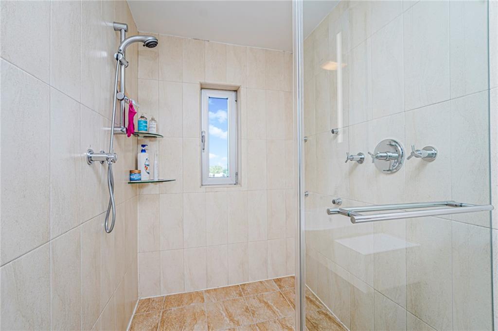 1702 Avenue Z, Unit 6B Brooklyn, NY 11235 - Photo 23 of 40 a bathroom with a bathtub and shower