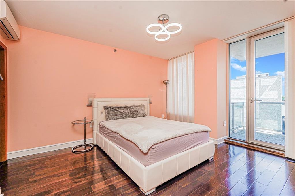 1702 Avenue Z, Unit 6B Brooklyn, NY 11235 - Photo 27 of 40 a bedroom with a bed and a window