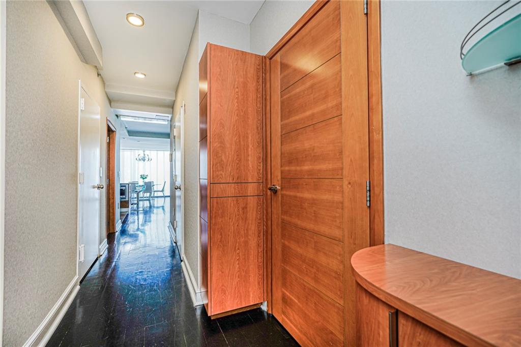 1702 Avenue Z, Unit 6B Brooklyn, NY 11235 - Photo 5 of 40 a bathroom with a sink and a mirror