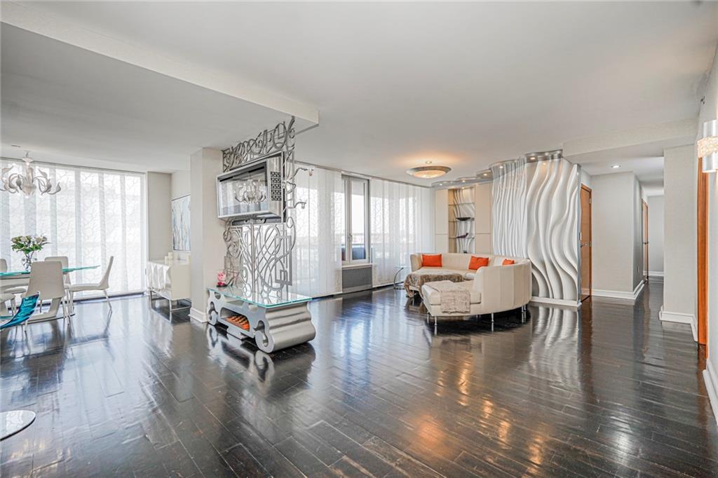 1702 Avenue Z, Unit 6B Brooklyn, NY 11235 - Photo 7 of 40 a living room with furniture and wooden floor