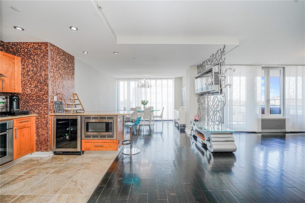 1702 Avenue Z, Unit 6B Brooklyn, NY 11235 - Photo 10 of 40 a living room with furniture window and wooden floor