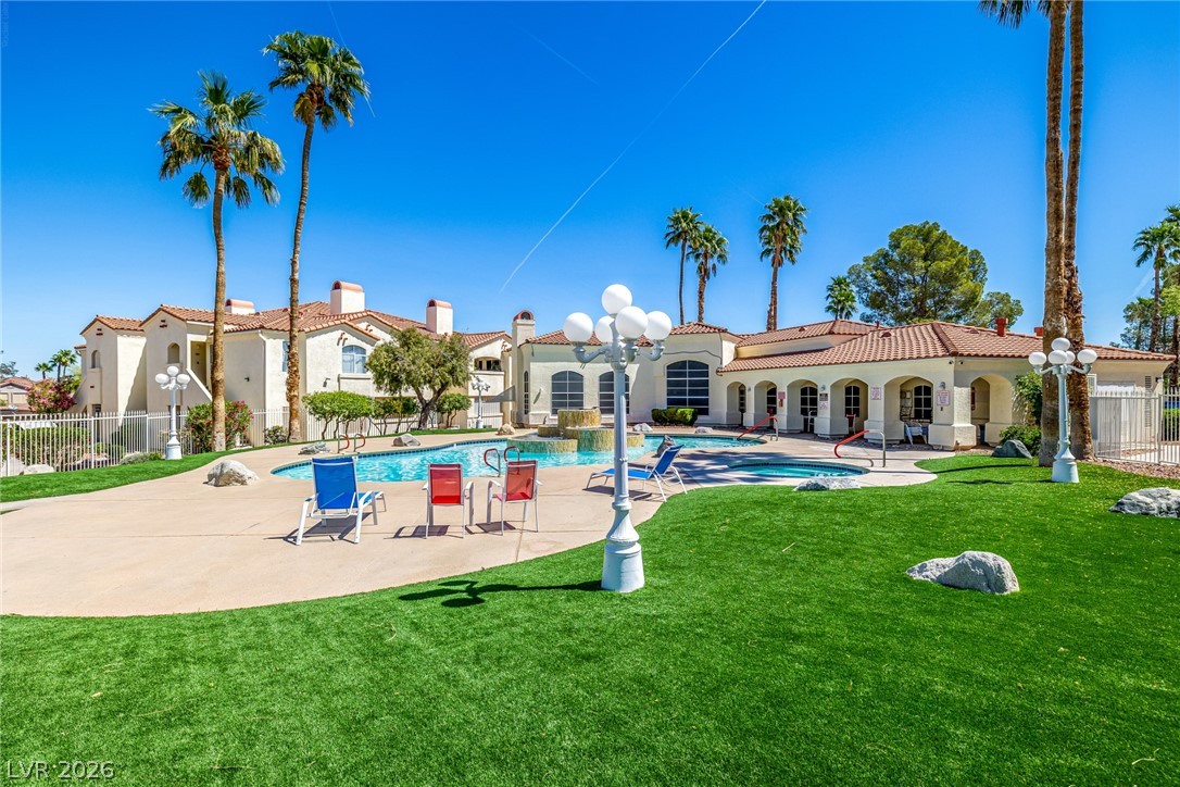 698 South Racetrack Road, Unit 124 Henderson, NV 89015 - Photo 28 of 29 Community pool with a patio and a residential view