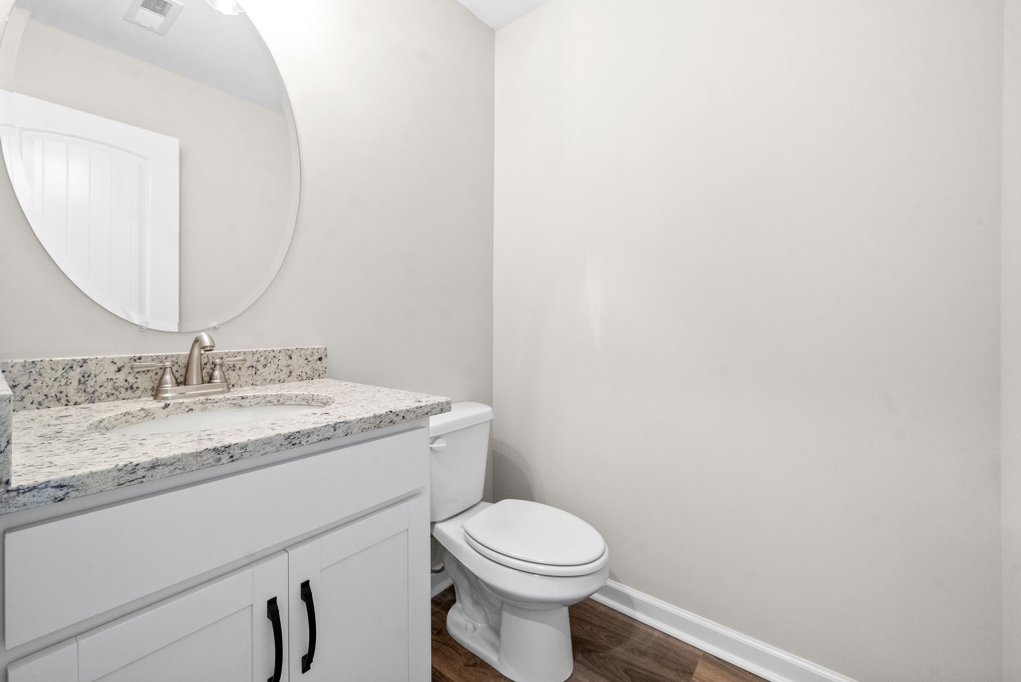 512 Edlin Street Clarksville, TN 37043 - Photo 12 of 20 a bathroom with a granite countertop sink and a mirror