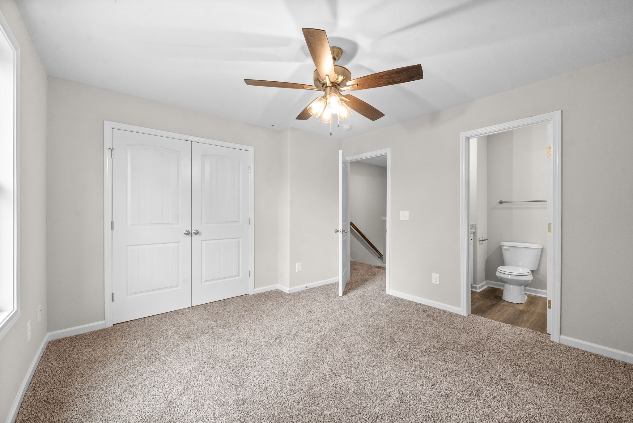 512 Edlin Street Clarksville, TN 37043 - Photo 15 of 20 a view of a room with a ceiling fan and bathroom