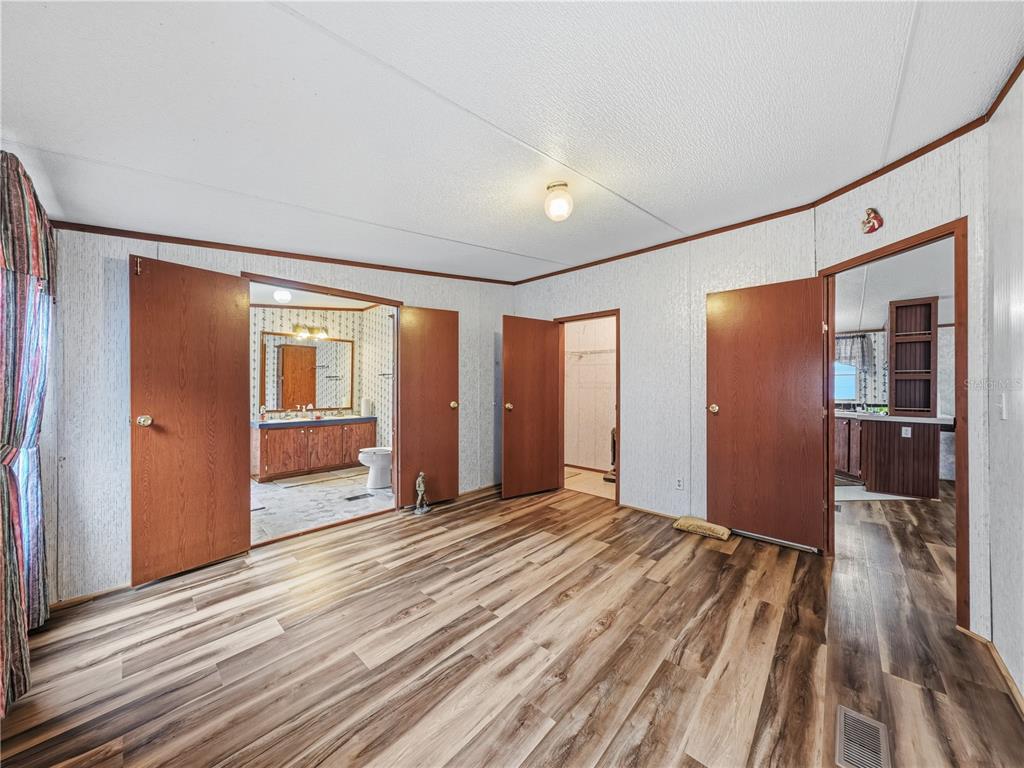 21210 137th Drive O'Brien, FL 32071 - Photo 12 of 49 a view of a livingroom with wooden floor