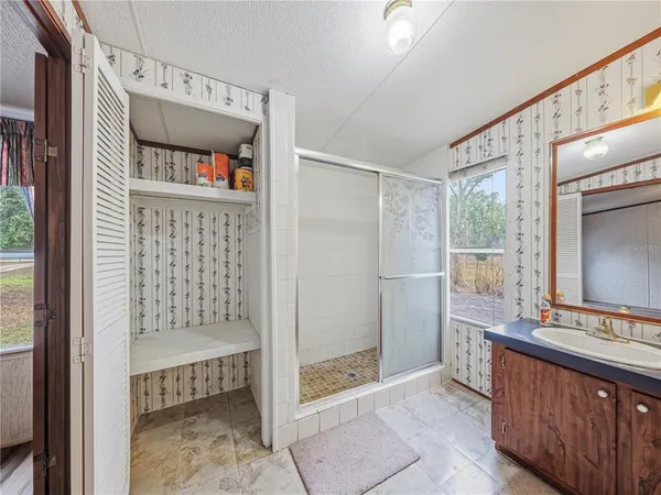 a bathroom with a bathtub and a sink