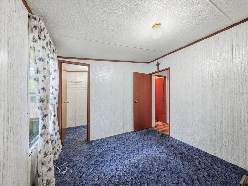 21210 137th Drive O'Brien, FL 32071 - Photo 19 of 49 a view of an empty room