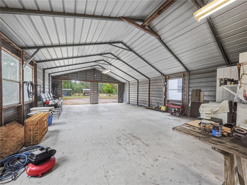 21210 137th Drive O'Brien, FL 32071 - Photo 31 of 49 a view of a room with gym equipment