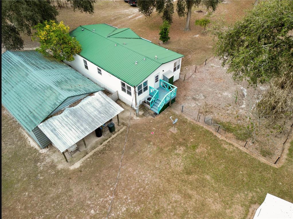 21210 137th Drive O'Brien, FL 32071 - Photo 43 of 49 an aerial view of a house with a yard and pool