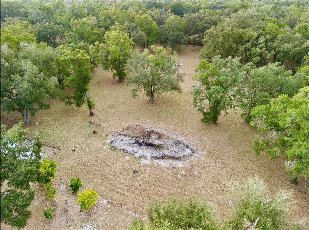 21210 137th Drive O'Brien, FL 32071 - Photo 48 of 49 a view of a lake with a house