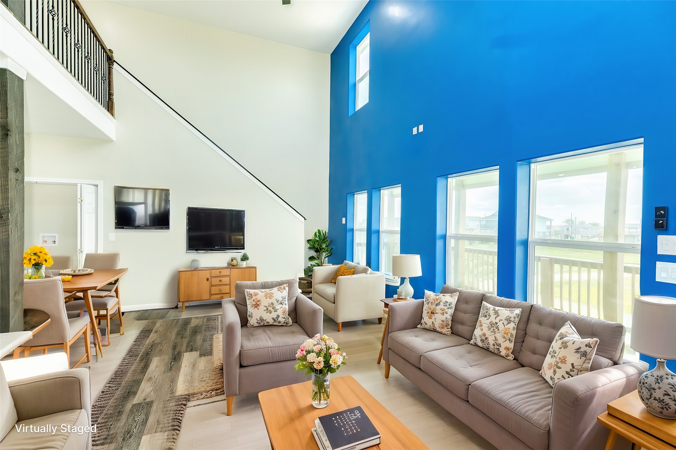 4726 Palm Street Freeport, TX 77541 - Photo 2 of 30 a living room with furniture and large windows