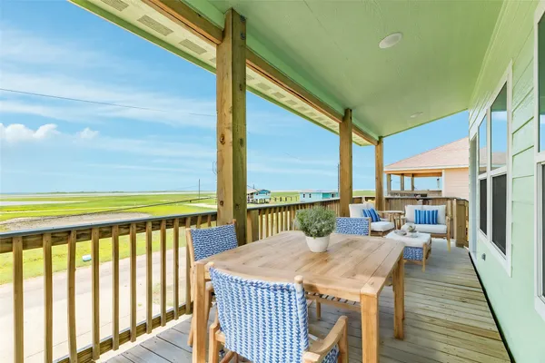 a view of a patio with swimming pool